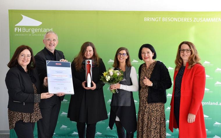 Am Foto: Charlotte Jautz, Landesgeschäftsführerin von Frau in der Wirtschaft Burgenland, FH Burgenland Geschäftsführer Georg Pehm, Eszter Toth, Leitung der Abteilung Personal, Organisation, Recht der FH Burgenland mit ihrer Mitarbeiterin Petra Kiradi, Andrea Gottweis, Spartenobfrau Handel und Petra Schumich, Landesvorsitzende von Frau in der Wirtschaft und Bezirksvorsitzende Eisenstadt.